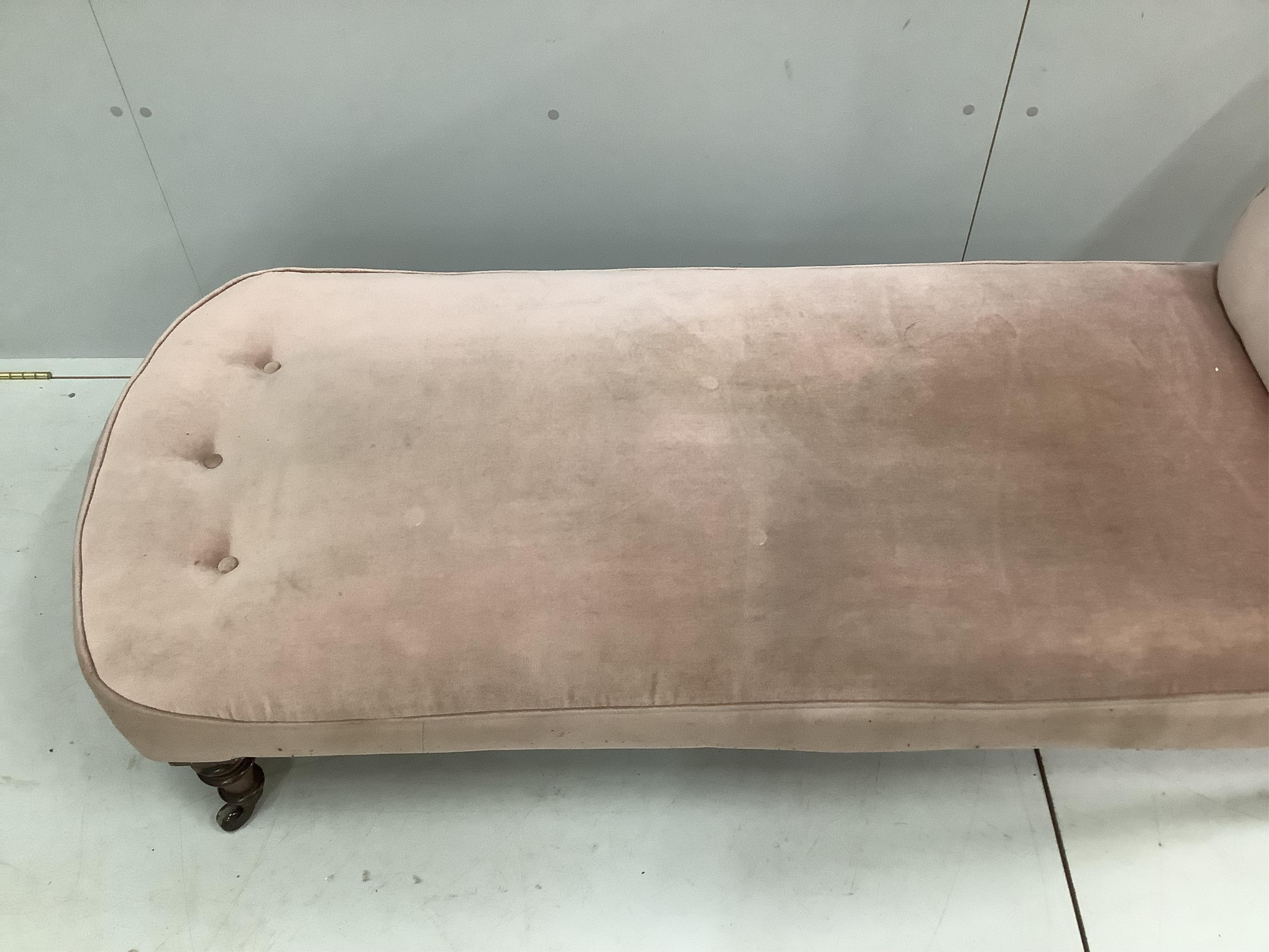 A late Victorian upholstered daybed, width 180cm, depth 66cm, height 71cm. Condition - fair